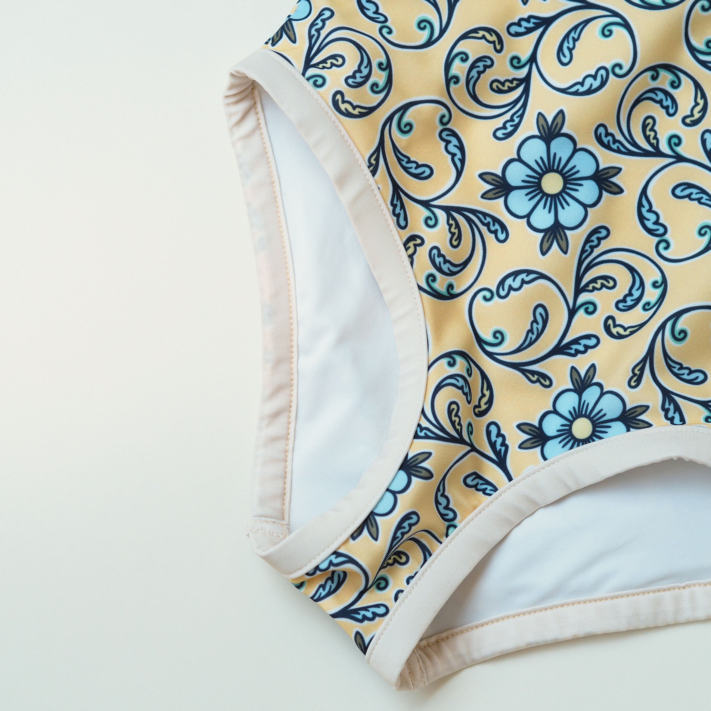 Meisje UV Badpak Coco Taormina - geel met blauwe bloemen